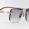 Sunglasses Model R04 in Color C440 with Grey Gradient lenses from John Dalia